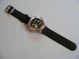 Black steps Swatch watch